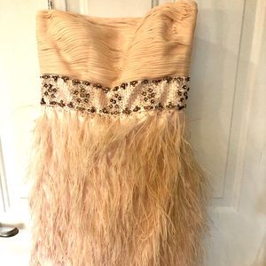 Make a statement in this beautiful cocktail dress.